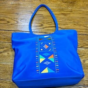 Kulanui of Hawaii Authentic Trademark cobalt blue neoprene tote purse.